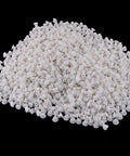 Pile of Must Have 1000 Pieces White Hinge Hole Plugs For Furniture And Home Improvement on black background