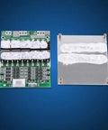 12V 100A 4S LiFePO4 Battery BMS Protection Board with protective coating placed on a blue background.