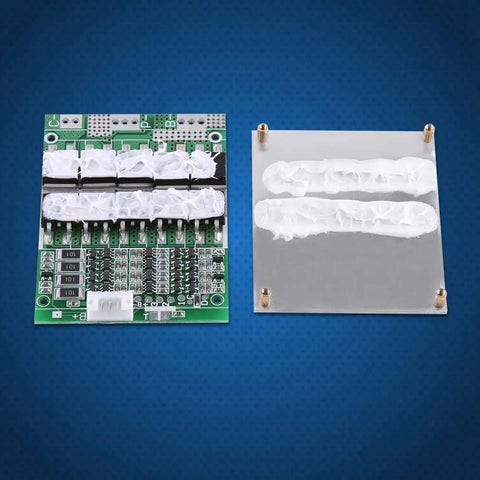 12V 100A 4S LiFePO4 Battery BMS Protection Board with protective coating placed on a blue background.