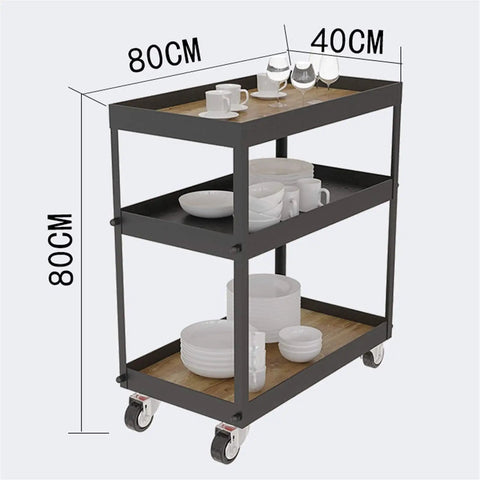 Three Tier Industrial Rolling Bar Cart With Thick Oak Shelves And Silent Casters For Living Room Hosting Hella Smooth Mobile Serving Trolley Top Shelf Storage Rack with glasses and dishes.