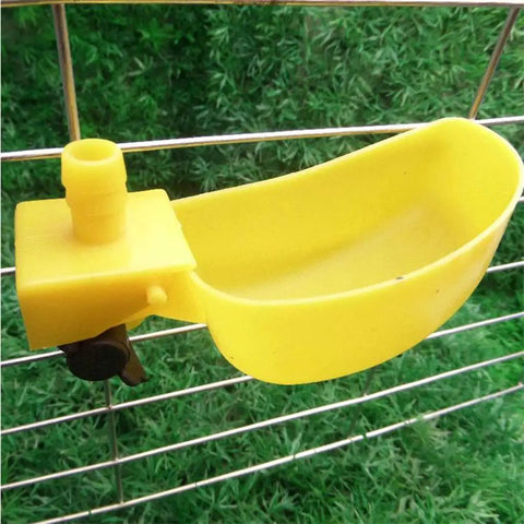 Top Tier Auto Fill Quail Water Cups 12 Pack Yellow Clip On Cage Drinkers for Pigeons showing a yellow plastic drinker attached to a cage.