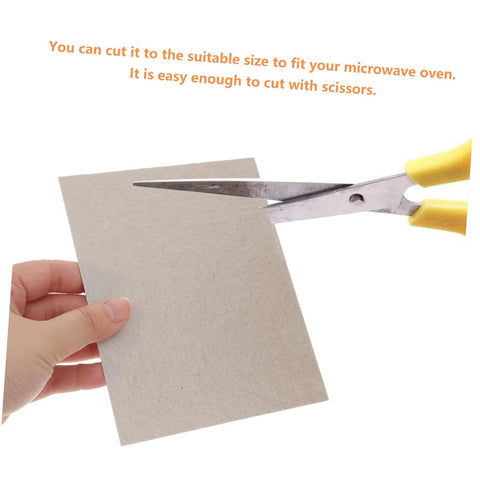 Cutting a sheet from the Mica Sheet Microwave Waveguide Cover Kit 12 Piece Heat Resistant Insulation Plate for Oil Spill Protection Universal Replacement for Cooking Appliances Cut to Fit Microwave Oven Parts