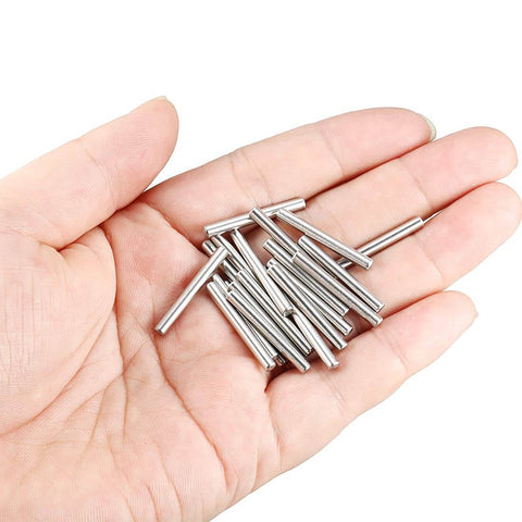 Close-up of a hand holding a 304 Stainless Steel Dowel Pin Set, 3mm X 25mm, 20 Pieces, Rust Resistant Wood Dowels For Furniture And Shelves