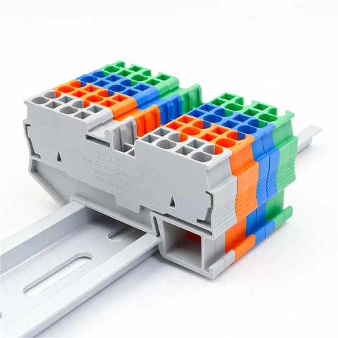 Ten Pack DIN Rail Terminal Block 4 Wire 2.5mm2 Spring Clamp Connector 300V ST 2.5 Quattro Green Heavy Duty installed on rail