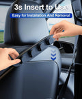 Person installing 2 Pack Car Seat Hooks For Tesla Model Y And Model 3 Purse Hanger on seat back for easy organization.