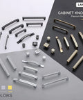 Variety of cabinet knobs in black, chrome, and gold finishes displayed on a surface, with different styles and sizes.