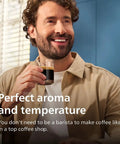 Man enjoying coffee from a glass, highlighting the Fully Automatic Espresso Coffee Maker With LatteGo Milk Frother And Ceramic Grinder For Smooth Daily Brewing At Home.