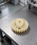 Beefed-Up Heavy Duty Cam Wheel Gear Replacement 4180-030-1800 on metal table in workshop setting