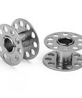 Close-up of two metal bobbins from 22 Piece Pro Grade Stainless Steel Sewing Machine Bobbin Set For Embroidery And Crafting Rust Resistant Durable