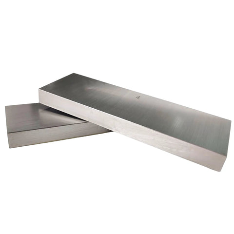 81 Piece Gauge Block Set In Inch Sizes Crafted From Hardened Alloy Tool Steel, two precision blocks with numerical markings.