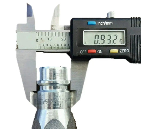 Close-up of a digital caliper measuring a component from the Beefy Heavy Duty Hydraulic Quick Disconnect Coupler Kit Eight Pack.