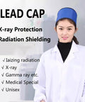Pro Grade Lead Shielding Cap For Radiation Safety, 0.35/0.5 Millimeter, worn by medical staff, blue cap in clinical setting