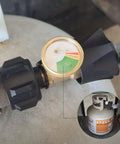 Close-up of a brass 2 Pack Propane Tank Level Gauge Indicator for LP Tanks 5lb to 40lb with QCC1 Type Leak Detector installed on a tank.