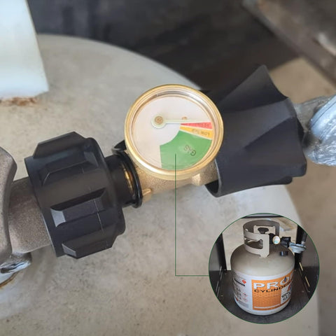 Close-up of a brass 2 Pack Propane Tank Level Gauge Indicator for LP Tanks 5lb to 40lb with QCC1 Type Leak Detector installed on a tank.