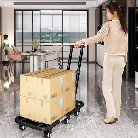 Smooth Rolling Folding Platform Trolley With Durable Steel Frame, Portable Flatbed Cart For No Sweat Household Hauling, Compact Utility Dolly For Garage Storage And Breezy Weekend Project Moving with boxes in modern interior.