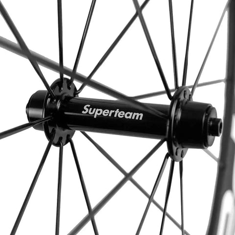 Close-up of hub on Dope Carbon Road Wheelset With Basalt Braking Surface, 38mm Rim Depth, 23mm Inner Width, 700c Clincher, Matte 3K Finish.