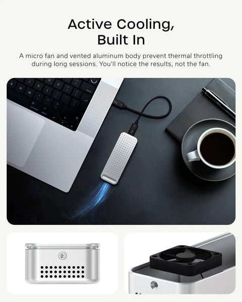 Rad Speed 80Gbps NVMe SSD Enclosure with USB4 V2 connector and active cooling on a desk near a laptop and coffee.