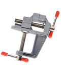 Rock Solid Mini Bench Vise, Clamp On Table Workstation Setup, close-up of smooth drive screw mechanism and clamp.