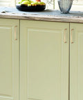 10 Pack Champagne Bronze 5 Inch Kitchen Cabinet Handles Made From Solid Zinc Alloy Durable Cabinet Pulls installed on cream cabinetry