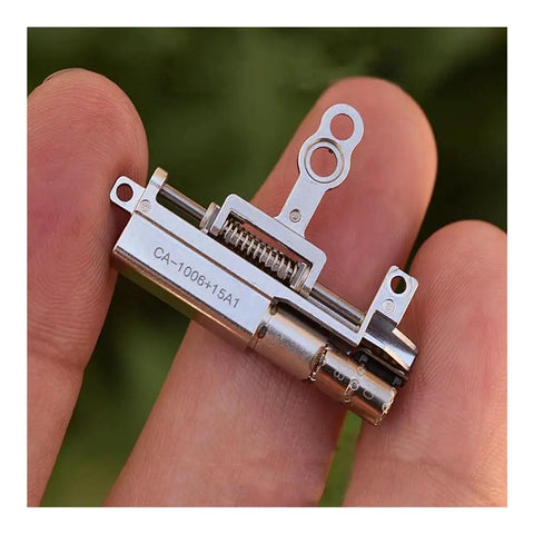 Close-up of 11mm Stroke Linear Actuator With 5V 2-Phase 4-Wire Precision Metal Gearbox Stepper Motor in hand.