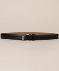 Real Deal Mens Leather Belt With Tough Metal Buckle Daily Casual And Office Strap In Classic Black Size 34 viewed on a neutral background.