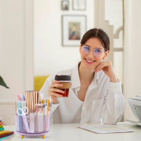 Smiling person at desk with Rotating Pencil And Pen Holder With Five Slots, Space Saving Desk Organizer for School, Home And Office.