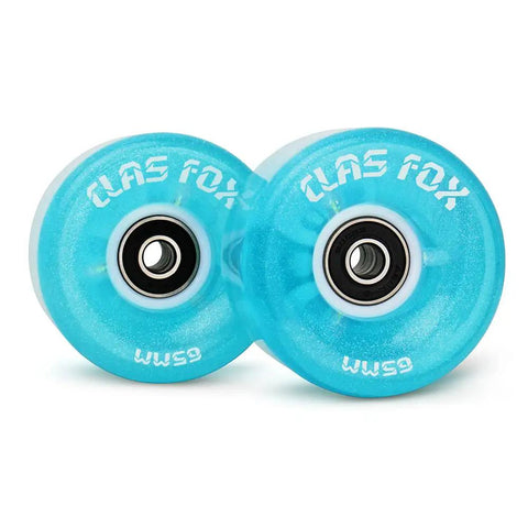 Blue lit up roller skate wheels with bright dots, 65mm by 35mm, ABEC 9 bearings installed, for indoor outdoor skating.