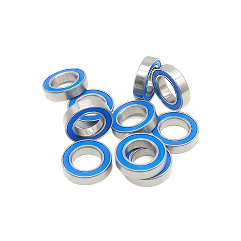 ABEC-7 6801RS ball bearing set 12x21x5mm with blue rubber cover, thin section, rustproof coating, shown in a pile