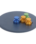 Adjustable Magnetic Soldering Fixture For PCB Boards with colorful metal weights on round base, top view