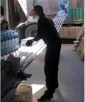 Ultra Lightweight Plastic Roller Conveyor Slides Six Pack 300 CM Long Warehouse conveyor loading bottles from truck