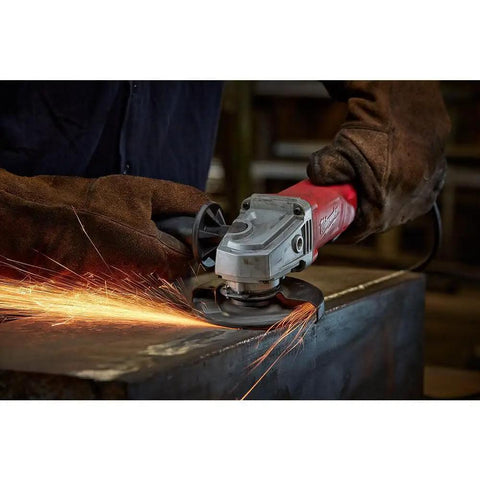 Heavy Duty Corded Angle Grinder 120 Volt With Soft Grip Handle cutting metal with sparks flying during use.