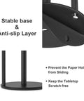 Bottom view of Matte Black Stainless Steel Paper Towel Holder With Weighted Base, highlighting anti-slip layer and stable design.