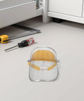 Boss Level Stainless Steel Mesh Face Shield And Rugged Welding Grinder Mask With No Sweat Ventilation For Tough Job Sites and Heavy Duty Workshop Grind on a workshop floor.