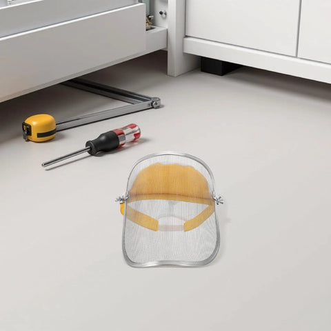 Boss Level Stainless Steel Mesh Face Shield And Rugged Welding Grinder Mask With No Sweat Ventilation For Tough Job Sites and Heavy Duty Workshop Grind on a workshop floor.