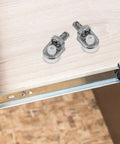 2 of the 24 Pack Zinc Alloy Shelf Support Pins for stable shelf placement on a wooden cabinet shelf with visible metal bracket.