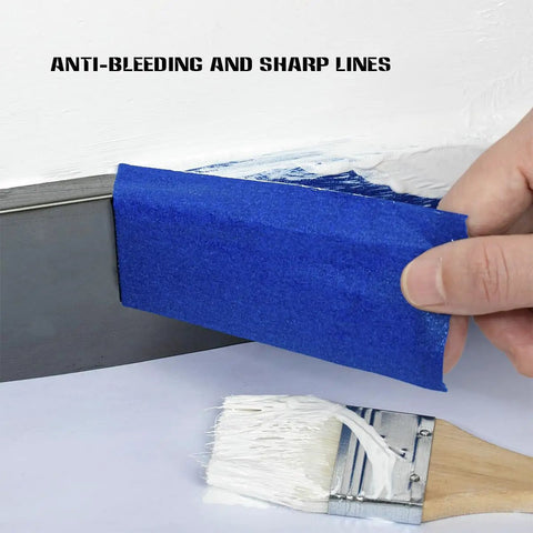 Person applying Blue Painter Tape 2 Inch Masking Tape Bulk For Multi Surface Projects With Sharp Lines And Residue Free Finish