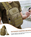 Person wearing Camouflage Oxford Cloth Outdoor Fishing Backpack With Large Capacity Tactical Hiking Daypack