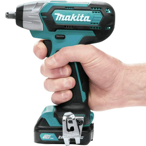 Hand holding 12V Max CXT Impact Wrench Kit With Ultra Compact Six Inch Body No Fuss Weighs Just 2.3 Lb Battery Included