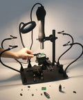 Helping Hands Soldering Third Hand 2 In 1 Solder Work Station With XYZ Axis Microscope, magnifier lamp, hands working on PCB