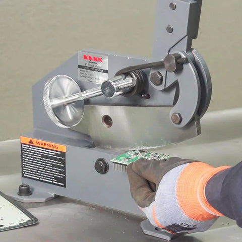 Heavy duty metal shear cutting through metal sheet with ease.