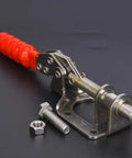 Built Tough Sus304 Stainless Steel Push Pull Quick Release Toggle Clamp With Rock Solid Grip For Heavy Metal Fabrication Welding Jigs And Shop Bench Assembly angled view with red handle and hardware.