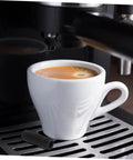 Two Pack Espresso Steam Wand Rubber Sleeve Covers For Heat Safety On Coffee Machines Easy To Install Prevent Burns Durable Rubber Guards For Baristas And Home Brews next to espresso cup