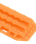 Close-up of the orange Sand Ladder For RC Cars Off Road Recovery Ramps 2 Pack Plastic RC Recovery Tool texture detail.