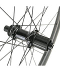 Beefy Carbon Wheelset 700C Disc Brakes 45mm Tubeless Ready Clincher showing hub with Pillar Spokes on Toray T700 Rim