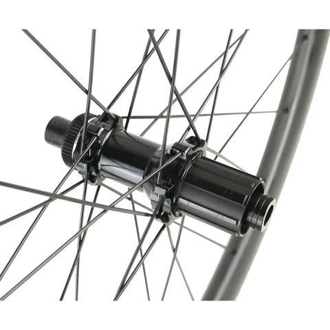 Beefy Carbon Wheelset 700C Disc Brakes 45mm Tubeless Ready Clincher showing hub with Pillar Spokes on Toray T700 Rim