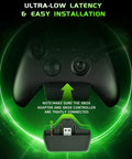 Black Xbox controller with adapter, highlighting connection for Wireless Gaming Headset For Xbox Series X S And Xbox One And PlayStation.