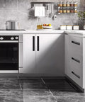 Modern kitchen with sleek cabinets featuring hidden black drawer pulls with embedded design, durable zinc alloy, and aluminum construction.