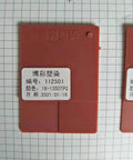 PLA Max Brick Red 1.75mm 1kg Filament sample card on grid background, showing umber red color.