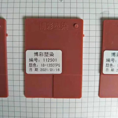 PLA Max Brick Red 1.75mm 1kg Filament sample card on grid background, showing umber red color.