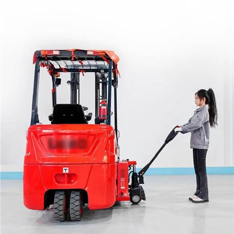 Powerful Full Electric Pallet Jack 4400 Lb Capacity For Moving Heavy Loads Smoothly In Narrow Spaces With Lithium Battery And Easy Walk Operate Industrial Truck, red truck viewed from rear with operator.
